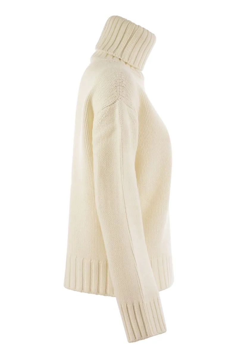 WOOL, SILK AND CASHMERE BLEND TURTLENECK SWEATER