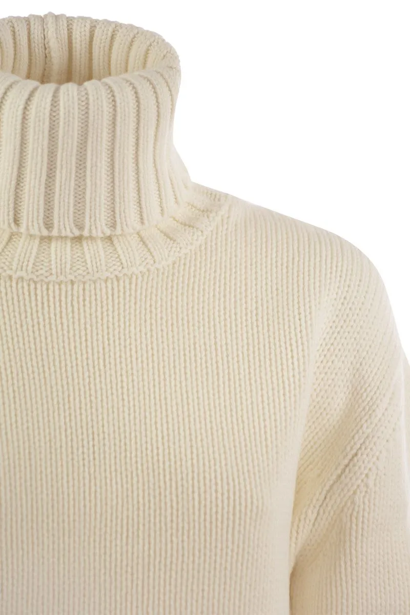 WOOL, SILK AND CASHMERE BLEND TURTLENECK SWEATER